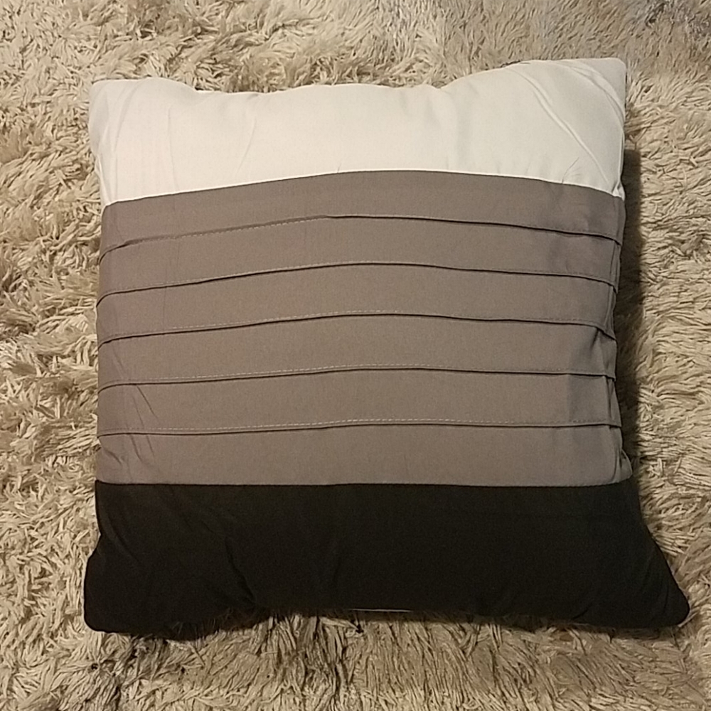 Decorative textile black white gray couch pillow